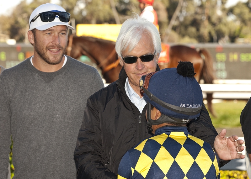 Winning owner: Bode Miller with Bob Baffert and jockey Martin Garcia after Carving, which he owned in partnership with Baffert’s wife, won at Hollywood Park in 2012. Benoit photo Winning owner: Bode Miller with Bob Baffert and jockey Martin Garcia after Carving, which he owned in partnership with Baffert’s wife, won at Hollywood Park in 2012. Benoit photo