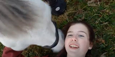 Rose Burgham, UK, meditating with her horse. Rose Burgham, UK, meditating with her horse.