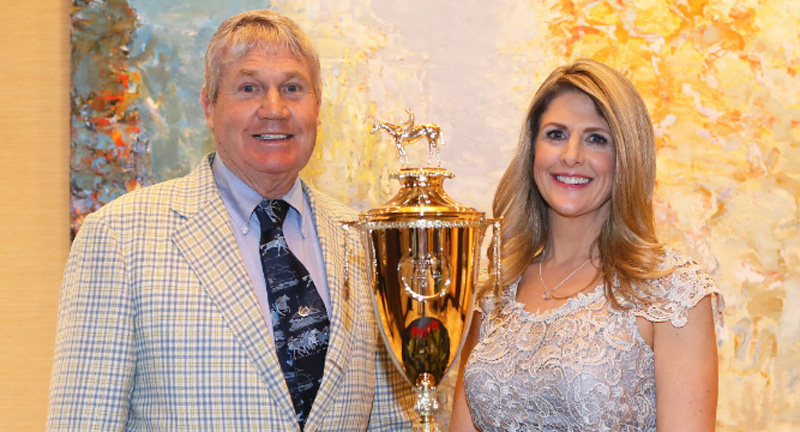 Ross Blackinton and daughter Susann Bleckinton-Juaire with the Kentucky Derby Trophy in 2018