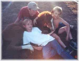 Donna’s niece and nephews with a foal they helped raise Donna’s niece and nephews with a foal they helped raise