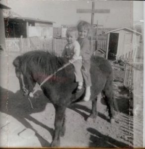 Donna with her older sister, Leah on their first pony, Christmas Donna with her older sister, Leah on their first pony, Christmas