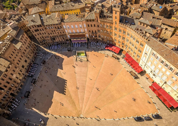 The central piazza in Siena is transformed on a race day. The central piazza in Siena is transformed on a race day.