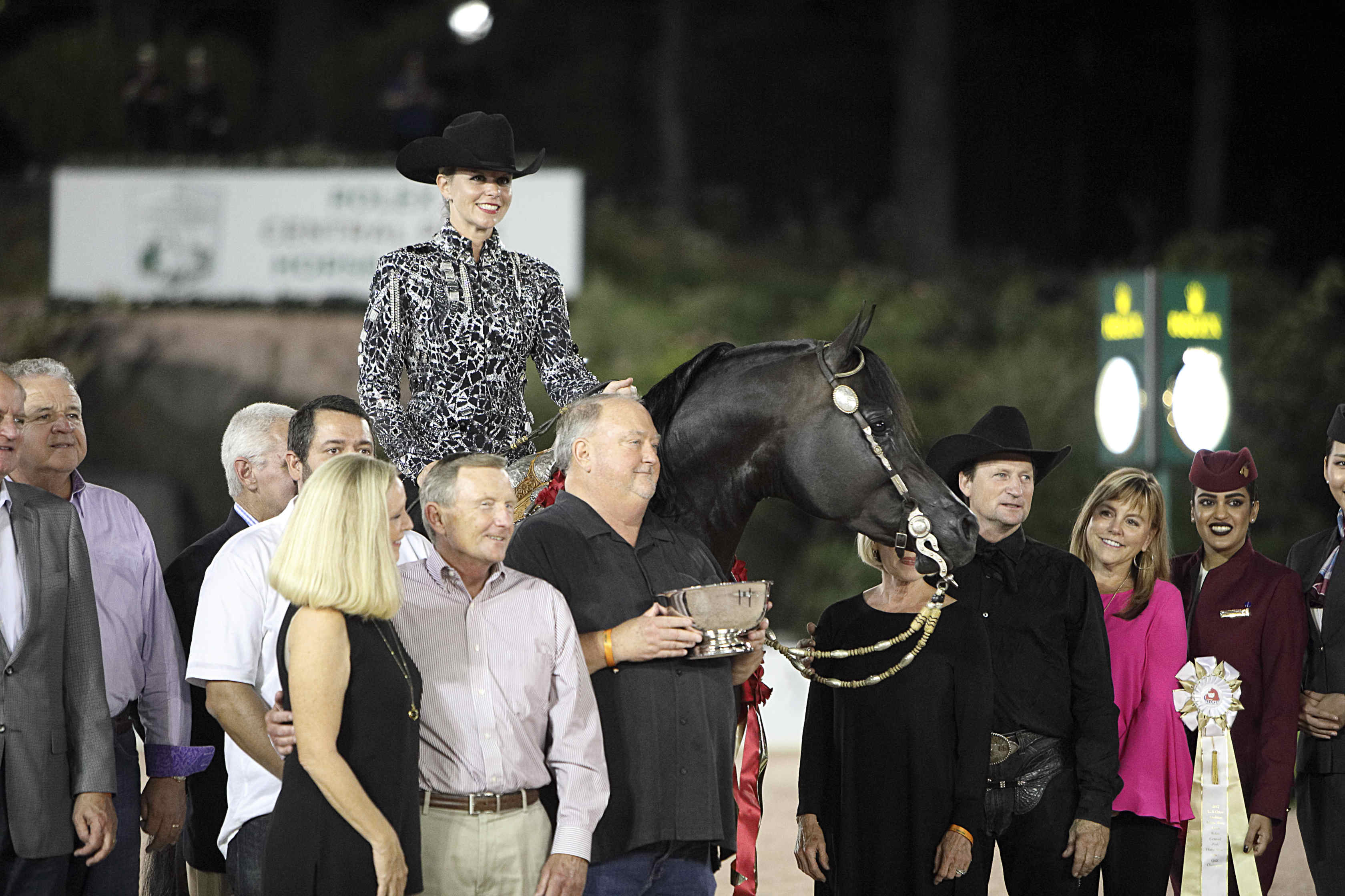 PA Kid Khan - Gold Champion Arabian Western Pleasure with trainer/pro rider Rob Bick (standing) & amateur rider Janie Heslep, photo courtesy of RCPHS PA Kid Khan - Gold Champion Arabian Western Pleasure with trainer pro rider Rob Bick (standing) & amateur rider Janie Heslep, photo courtesy of RCPHS