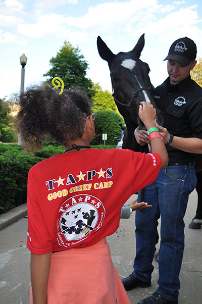 Klinger greets a TAPS family member at the Pentagon tour, May 22, 2015, courtesy of TAPS Klinger greets a TAPS family member at the Pentagon tour, May 22, 2015, courtesy of TAPS